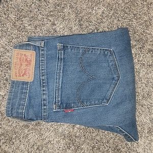 Levi's 712 slim mid rise blue jeans, size 27